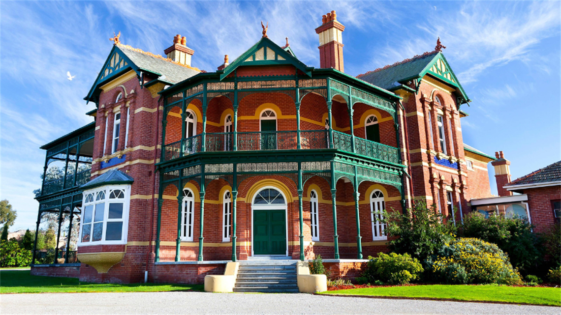 The facade of Bundoora Homestead Arts Centre, a magnificent Queen Anne-style Federation mansion