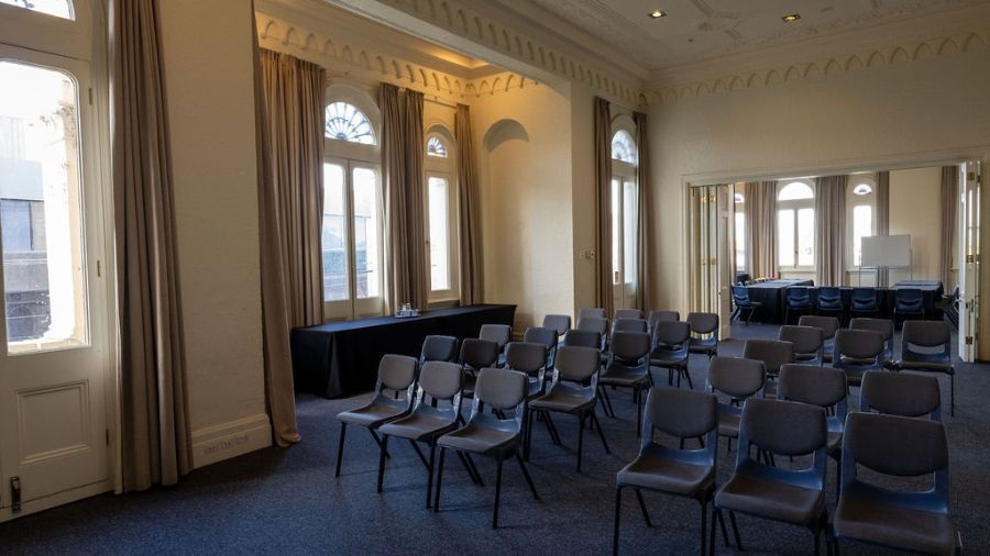 The main rooms on the first floor of Northcote Town Hall Arts Centre set up with chairs.