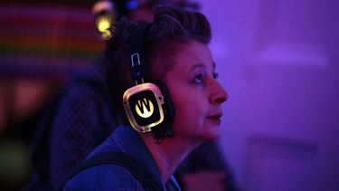 A person wearing headphones.