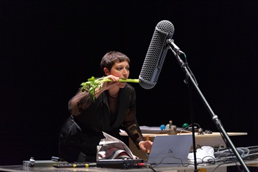 Aviva Endean with a celery in her mouth. Image by Sarah Walker