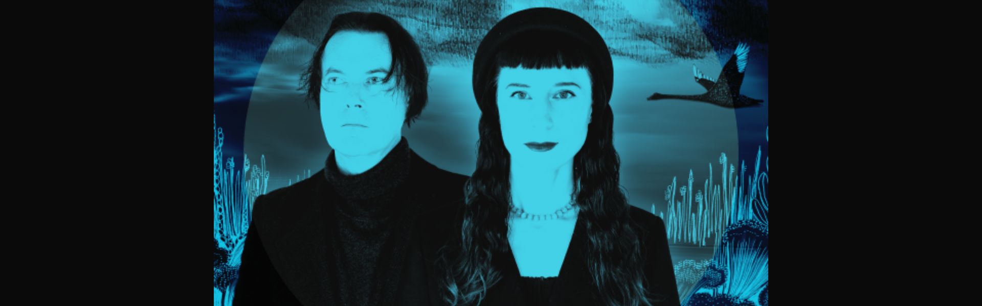 A man with short dark hair and a woman with long dark hair wear dark outfits. They stand side by side in front a forested backdrop. A blue hue is overlaid on the image.
