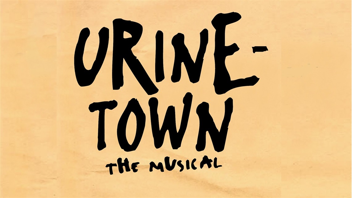 In black text the words Urine-Town the musical.