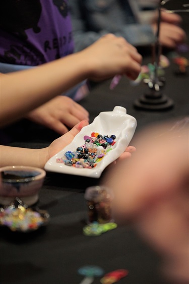 Charm and bracelet making workshop with Elijah Money at Ganbu Gulin 2026 image by James Henry