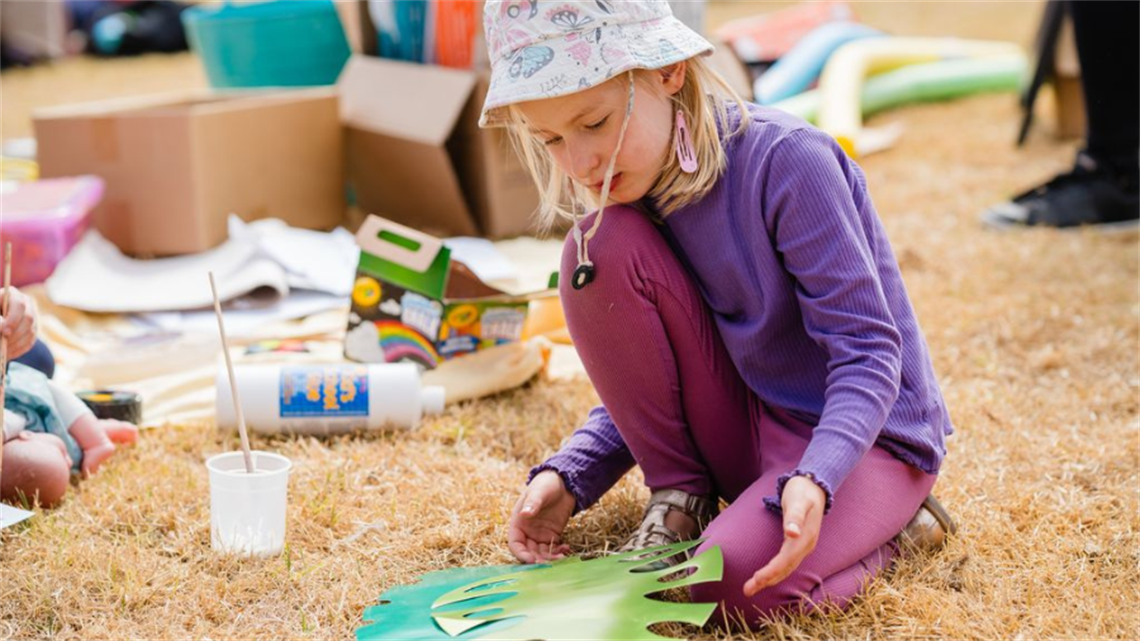 A child works on an arts project 