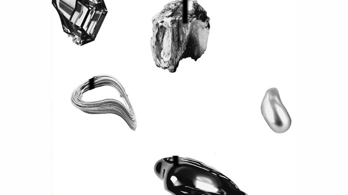 A black and white image of rocks and jewels.