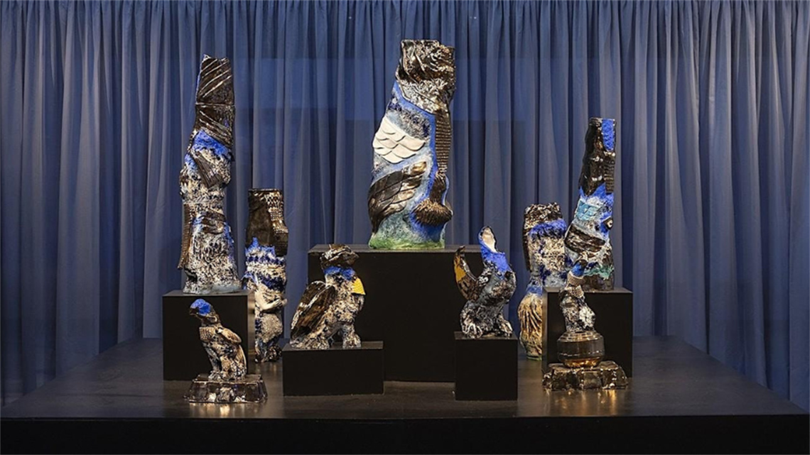 A collection of colourful clay artworks